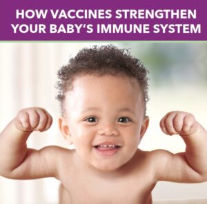 Smiling baby flexing arms confidently.